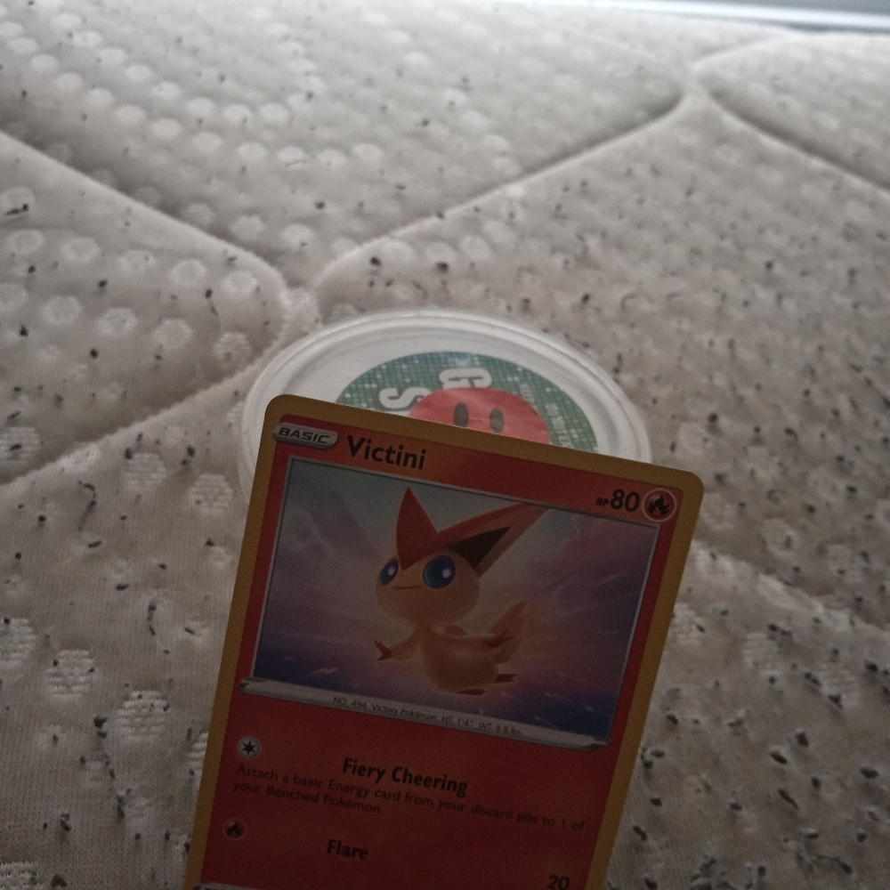 Pokemon Victini Trading Card - Red and Orange